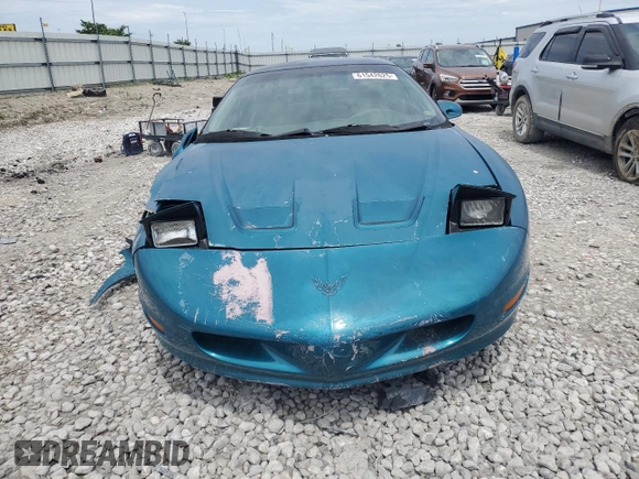 1995 Pontiac Firebird Firebird z VIN 2G2FS22S6S2237631, wystawiony jako Copart lot #61542625 z przebiegiem Nie podano mil oraz Szkoda całkowita • Salvage title. Historia ofert i sprzedaży dostępna na DreamBid. Obrazek 5.