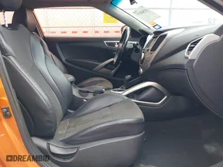 2015 Hyundai Veloster RE:FLEX with VIN KMHTC6AD8FU238345, listed as a IAAI auction lot 41549377 with 117,240 mi miles. Bid and sale history available at carsss.com. Image 5.