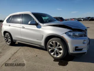 2017 BMW X5 sDrive35i with VIN 5UXKR2C51H0U19230, listed as a Copart auction lot 52731495 with 64,454 mi miles and Salvage Title. Bid and sale history available at carsss.com. Image 4.