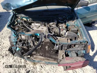 1995 Ford Escort z VIN 1FASP15J8SW308311, wystawiony jako Copart lot #77624004 z przebiegiem 345 777 mil mil oraz Szkoda całkowita • Salvage title. Historia ofert i sprzedaży dostępna na DreamBid. Obrazek 12.