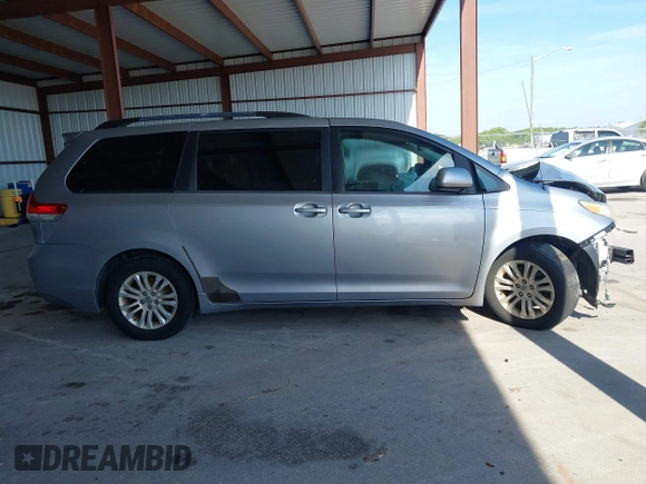 2013 Toyota Sienna XLE AAS with VIN 5TDYK3DC3DS297044, listed as a IAAI auction lot 42552470 with 143,947 mi miles and . Bid and sale history available at DreamBid. Image 13.