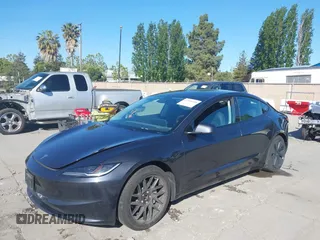2024 Tesla Model 3 Long Range z VIN 5YJ3E1EB2RF740291, wystawiony jako IAAI lot #42124138 z przebiegiem 36 452 mil mil oraz . Historia ofert i sprzedaży dostępna na DreamBid. Obrazek 6.