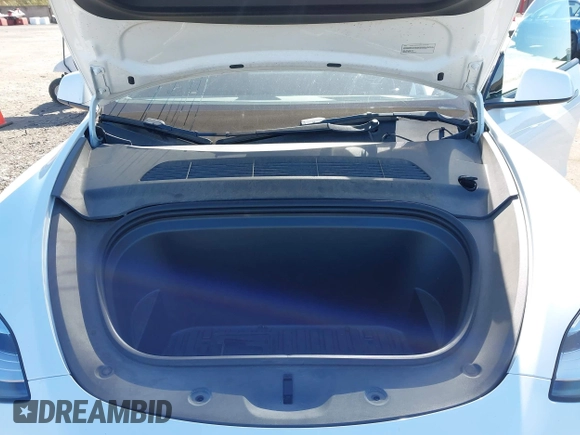 2022 Tesla Model Y Long Range with VIN 7SAYGDEE1NF364241, listed as a IAAI auction lot 42190272 with 54,878 mi miles and . Bid and sale history available at DreamBid. Image 10.