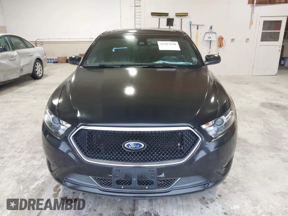 2013 Ford Taurus SHO с VIN 1FAHP2KT8DG159577, выставлен на аукционе IAAI как лот 41107630 с пробегом 90 865 миль миль и . История ставок и продаж доступна на DreamBid. Изображение 13.