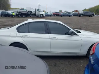 2014 BMW 3 Series 328i xDrive with VIN WBA3B5C56EP544400, listed as a IAAI auction lot 42172100 with 242,472 mi miles. Bid and sale history available at carsss.com. Image 13.