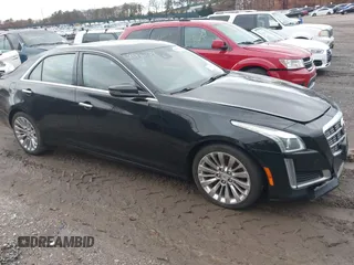 2014 Cadillac CTS Luxury AWD with VIN 1G6AX5SX9E0195923, listed as a IAAI auction lot 40946334 with Not Provided miles and . Bid and sale history available at carsss.com. Image 13.