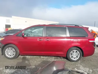 2014 Toyota Sienna XLE with VIN 5TDYK3DCXES471676, listed as a IAAI auction lot 41853038 with 169,790 mi miles. Bid and sale history available at carsss.com. Image 14.