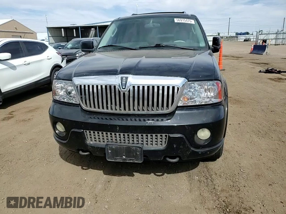 2004 Lincoln Navigator Luxury z VIN 5LMFU28R74LJ17939, wystawiony jako Copart lot #56915475 z przebiegiem 197 401 mil mil oraz Szkoda całkowita • Salvage title. Historia ofert i sprzedaży dostępna na DreamBid. Obrazek 14.