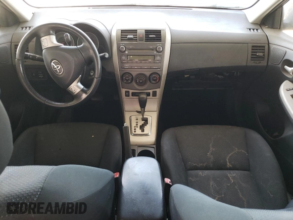 2010 Toyota Corolla z VIN 2T1BU4EE6AC455239, wystawiony jako Copart lot #60570335 z przebiegiem 256 499 mil mil oraz Szkoda całkowita • Salvage title. Historia ofert i sprzedaży dostępna na DreamBid. Obrazek 8.