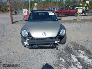 2013 Volkswagen Beetle Convertible 2.5L with VIN 3VW5X7AT9DM816045, listed as a IAAI auction lot 41488594 with 51,572 mi miles. Bid and sale history available at carsss.com. Image 13.