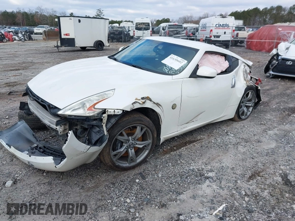 2012 Nissan 370Z Touring with VIN JN1AZ4EH4CM565125, listed as a IAAI auction lot 41630602 with 121,823 mi miles. Bid and sale history available at carsss.com. Image 2.