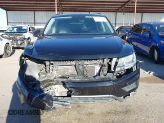 2021 Volkswagen Tiguan SE z VIN 3VV3B7AX0MM080853, wystawiony jako IAAI lot #42406539 z przebiegiem 73 295 mil mil oraz . Historia ofert i sprzedaży dostępna na DreamBid. Obrazek 13.