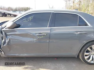 2018 Chrysler 300 Touring with VIN 2C3CCAAG6JH304263, listed as a IAAI auction lot 41070181 with 104,615 mi miles and . Bid and sale history available at DreamBid. Image 13.