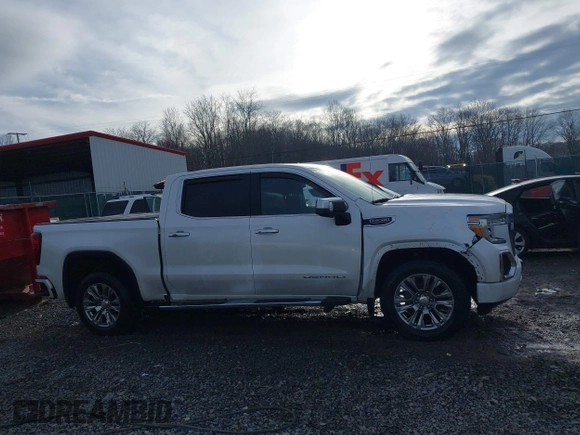 2020 GMC Sierra 1500 Denali with VIN 1GTU9FED8LZ370425, listed as a IAAI auction lot 41172378 with 57,291 mi miles and . Bid and sale history available at DreamBid. Image 13.