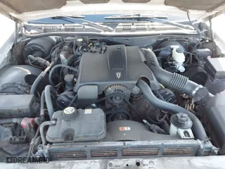 2003 Mercury Grand Marquis LS Premium with VIN 2MEFM75W33X650756, listed as a IAAI auction lot 41829977 with 130,879 mi miles. Bid and sale history available at carsss.com. Image 10.
