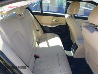 2021 BMW 3 Series 330i с VIN 3MW5R1J0XM8B69340, выставлен на аукционе IAAI как лот 41864211 с пробегом 63 614 миль миль и . История ставок и продаж доступна на DreamBid. Изображение 8.