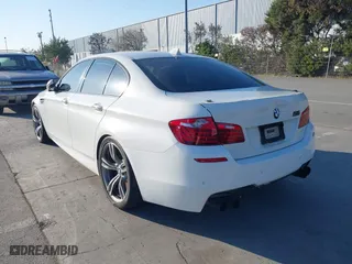 2014 BMW M5 with VIN WBSFV9C55ED593614, listed as a IAAI auction lot 41777369 with 144,076 mi miles. Bid and sale history available at carsss.com. Image 3.