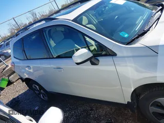 2018 Subaru Forester Premium with VIN JF2SJAGC7JH494972, listed as a IAAI auction lot 40811840 with 65,239 mi miles and . Bid and sale history available at DreamBid. Image 14.