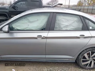 2020 Volkswagen Jetta GLI S z VIN 3VW6T7BU9LM011281, wystawiony jako IAAI lot #41576884 z przebiegiem 66 252 mil mil oraz . Historia ofert i sprzedaży dostępna na DreamBid. Obrazek 15.