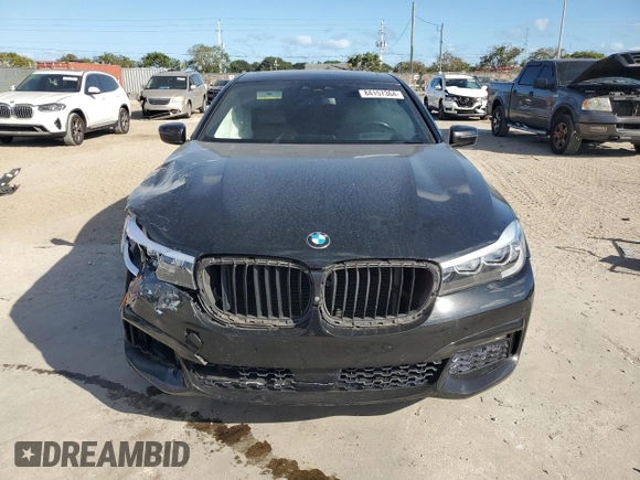 2017 BMW 7 Series 740i with VIN WBA7E2C51HG739462, listed as a Copart auction lot 84157364 with 137,881 mi miles and Salvage Title. Bid and sale history available at carsss.com. Image 5.