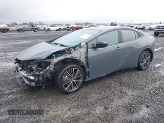 2024 Toyota Prius LE z VIN JTDADABU4R3015000, wystawiony jako IAAI lot #41147221 z przebiegiem 4 411 mil mil oraz . Historia ofert i sprzedaży dostępna na DreamBid. Obrazek 18.