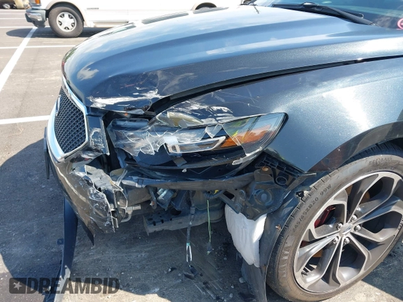 2013 Ford Taurus SHO z VIN 1FAHP2KT1DG135962, wystawiony jako IAAI lot #42449604 z przebiegiem 138 921 mil mil oraz . Historia ofert i sprzedaży dostępna na DreamBid. Obrazek 6.