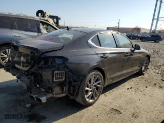 2022 Genesis G70 2.0T with VIN KMTG34TA9NU093622, listed as a Copart auction lot 77797024 with 51,637 mi miles and Salvage Title. Bid and sale history available at carsss.com. Image 3.
