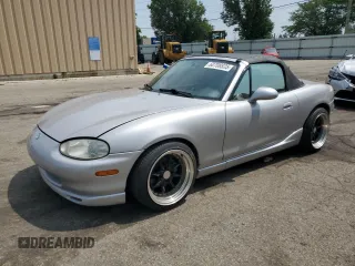 2000 Mazda MX-5 Miata with VIN JM1NB3538Y0142306, listed as a Copart auction lot 60708835 with 181,068 mi miles and Salvage title. Bid and sale history available at DreamBid. Image 1.