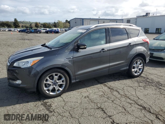 2015 Ford Escape Titanium with VIN 1FMCU0J98FUA46879, listed as a Copart auction lot 51173555 with 72,093 mi miles and Salvage Title. Bid and sale history available at DreamBid. Image 1.