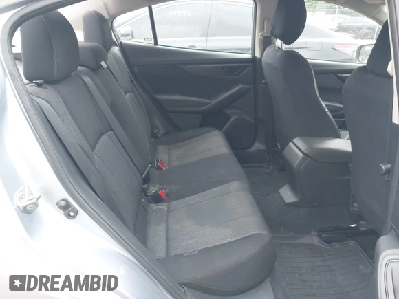 2019 Subaru Impreza with VIN 4S3GKAB60K3608733, listed as a IAAI auction lot 42361729 with 58,863 mi miles and . Bid and sale history available at DreamBid. Image 8.