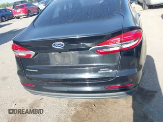 2019 Ford Fusion SEL with VIN 3FA6P0MU5KR203851, listed as a IAAI auction lot 41982637 with 96,954 mi miles and . Bid and sale history available at DreamBid. Image 16.