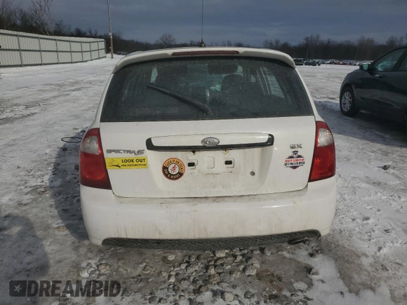 2007 Kia Spectra with VIN KNAFE162475006498, listed as a Copart auction lot 42902375 with 122,865 mi miles and Salvage Title. Bid and sale history available at carsss.com. Image 6.