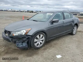 2009 Honda Accord Sdn EX-L with VIN 1HGCP26849A123455, listed as a Copart auction lot 50768085 with 124,497 mi miles and Salvage Title. Bid and sale history available at carsss.com. Image 1.