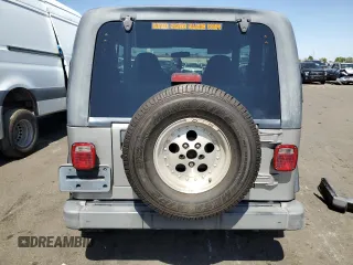 2002 Jeep Wrangler X with VIN 1J4FA39S32P708163, listed as a Copart auction lot 69703254 with 119,843 mi miles and Salvage Title. Bid and sale history available at carsss.com. Image 6.