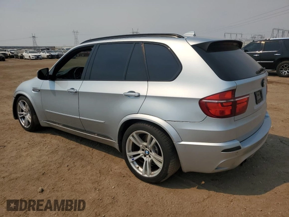 2011 BMW X5 M with VIN 5YMGY0C58BLK26357, listed as a Copart auction lot 71443774 with 116,973 mi miles and Salvage Title. Bid and sale history available at carsss.com. Image 2.