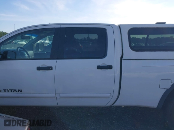 2008 Nissan Titan XE z VIN 1N6AA07FX8N309885, wystawiony jako IAAI lot #42847181 z przebiegiem 192 595 mil mil oraz . Historia ofert i sprzedaży dostępna na DreamBid. Obrazek 14.