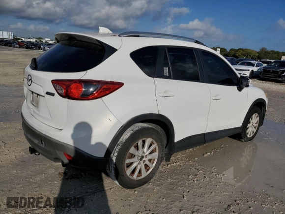 2014 Mazda CX-5 Sport with VIN JM3KE2BE5E0346882, listed as a Copart auction lot 45426995 with 209,435 mi miles and Clean Title. Bid and sale history available at carsss.com. Image 3.