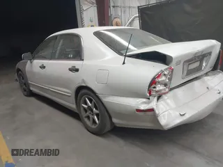 2003 Mitsubishi Diamante LS z VIN 6MMAP67P13T012396, wystawiony jako IAAI lot #40668729 z przebiegiem 157 250 mil mil oraz . Historia ofert i sprzedaży dostępna na DreamBid. Obrazek 3.