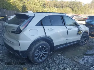 2024 Cadillac XT4 AWD Sport with VIN 1GYFZFR44RF195386, listed as a Copart auction lot 74949924 with 2,693 mi miles and Salvage title. Bid and sale history available at DreamBid. Image 3.