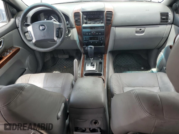 2006 Kia Sorento LX z VIN KNDJD733265572903, wystawiony jako Copart lot #56123945 z przebiegiem 185 664 mil mil oraz Szkoda całkowita • Salvage title. Historia ofert i sprzedaży dostępna na DreamBid. Obrazek 8.