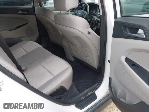 2016 Hyundai Tucson Sport with VIN KM8J33A2XGU242256, listed as a IAAI auction lot 41065573 with 97,503 mi miles. Bid and sale history available at carsss.com. Image 8.