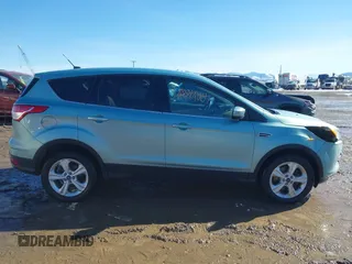 2013 Ford Escape SE z VIN 1FMCU9GX3DUC55471, wystawiony jako IAAI lot #41484007 z przebiegiem 174 381 mil mil oraz . Historia ofert i sprzedaży dostępna na DreamBid. Obrazek 13.