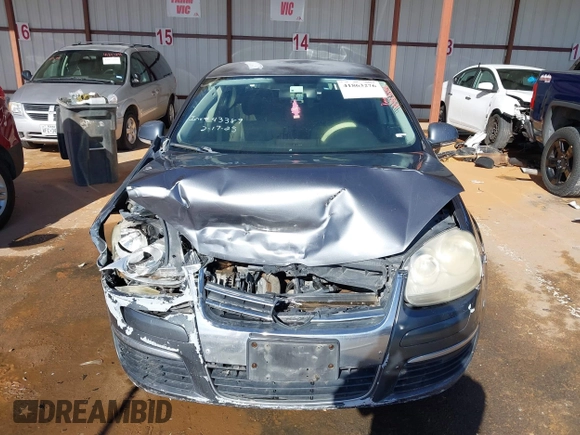 2007 Volkswagen Jetta 2.5 z VIN 3VWRF71K37M101410, wystawiony jako IAAI lot #41863276 z przebiegiem 195 616 mil mil oraz . Historia ofert i sprzedaży dostępna na DreamBid. Obrazek 12.
