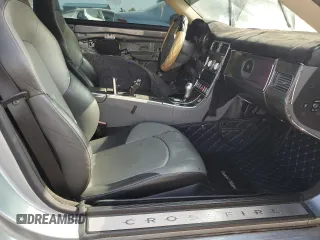 2005 Chrysler Crossfire Limited z VIN 1C3AN69L05X035386, wystawiony jako Copart lot #70837984 z przebiegiem 36 500 mil mil oraz Czysty tytuł • Clean title. Historia ofert i sprzedaży dostępna na DreamBid. Obrazek 10.