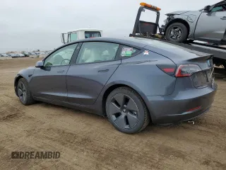 2021 Tesla Model 3 Long Range with VIN 5YJ3E1EB2MF852663, listed as a Copart auction lot 54726615 with 29,215 mi miles and Clean Title. Bid and sale history available at carsss.com. Image 2.