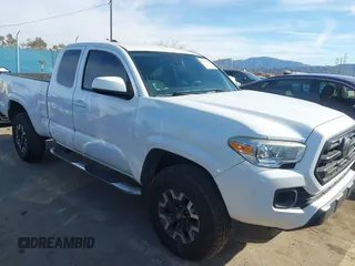 2018 Toyota Tacoma SR with VIN 5TFRX5GN9JX106232, listed as a IAAI auction lot 41634120 with 66,674 mi miles and . Bid and sale history available at carsss.com. Image 1.