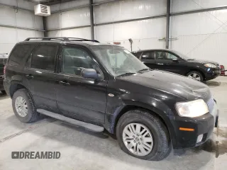 2005 Mercury Mariner Luxury z VIN 4M2YU57145DJ26214, wystawiony jako Copart lot #42154255 z przebiegiem Nie podano mil oraz Tytuł czysty. Historia ofert i sprzedaży dostępna na DreamBid. Obrazek 4.