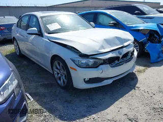 2015 BMW 3 Series 320i with VIN WBA3B1G56FNT06434, listed as a IAAI auction lot 41772918 with 76,782 mi miles. Bid and sale history available at carsss.com. Image 1.