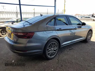 2020 Volkswagen Jetta S z VIN 3VWC57BU5LM089408, wystawiony jako Copart lot #57877895 z przebiegiem 40 172 mil mil oraz Czysty tytuł • Clean title. Historia ofert i sprzedaży dostępna na DreamBid. Obrazek 3.