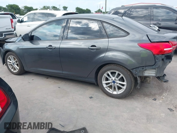 2018 Ford Focus SE with VIN 1FADP3F22JL295342, listed as a IAAI auction lot 42335881 with 77,464 mi miles and . Bid and sale history available at DreamBid. Image 15.